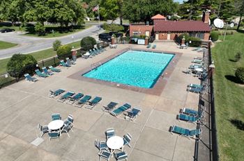Large outdoor swimming pool with sundeck
