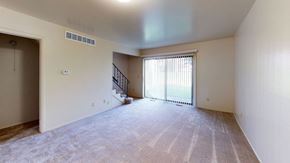 Kalamazoo townhouse for rent - Two bedroom living room leading to a patio at Mount Royal Townhomes, Michigan