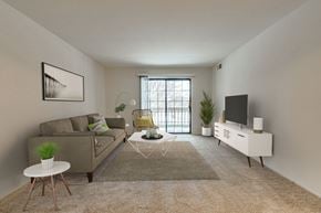 East Moline apartment for rent - Magnolia Layout Model Living Room at Fox Pointe Apartments, 61244
