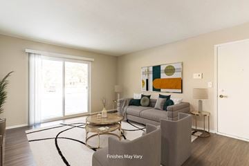 Farmington Hills apartment for rent - a living room with a couch and a chair