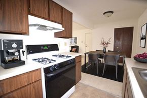 East Moline apartment for rent - Magnolia and Dahlia Kitchen and Dining Room at Fox Pointe Apartments, Illinois