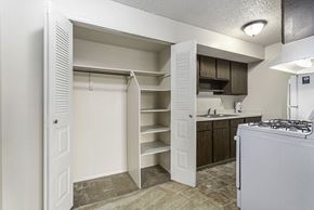 Michigan City apartment for rent - A dining room with a spacious closet at Normandy Village Apartments in Michigan City, IN