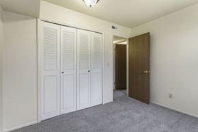 Michigan City apartment for rent - a bedroom with a large closet at Normandy Village Apartments, Indiana