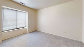 Oak Creek apartment for rent - Spacious bedroom with a large window at Oak Shores Apartments, Oak Creek, Wisconsin