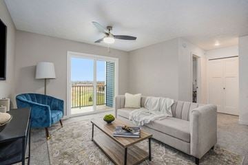 Grand Rapids apartment for rent - a living room with a couch and a table