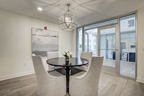 Roanoke apartment for rent - A dining room with a table and chairs. at Sunscape Apartments, Virginia