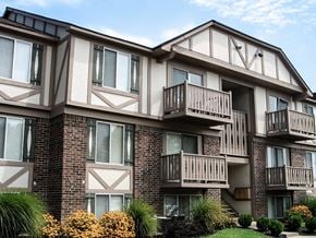 Evansville apartment for rent - the outlook of a condo building with balconies at The Timbers Apartments, Evansville, IN, 47715