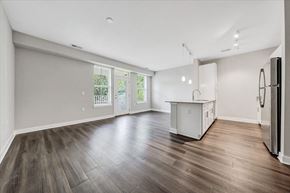 Roanoke apartment for rent - A kitchen area with a refrigerator on the right side at The Retreat Apartments, Roanoke, 24019