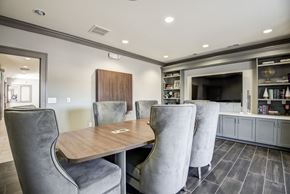 Roanoke apartment for rent - A modern dining room with grey chairs and a wooden table at The Retreat Apartments, Roanoke, 24019