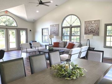 Holland apartment for rent - a large living room with a table and chairs