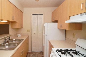 Kitchen with a breakfast bar and pantry