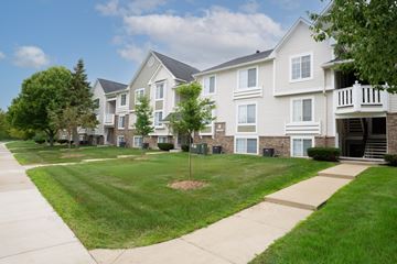 Belleville apartment for rent - Apartment complex with a green lawn in front.