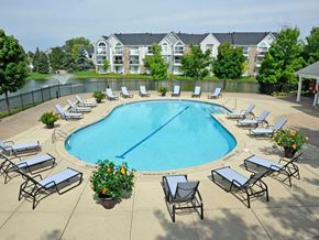 Wixom apartment for rent - Gated Outdoor Pool and Sundeck at Hillside Apartments, Wixom, Michigan