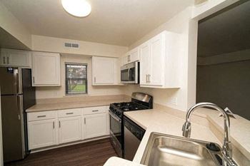 A kitchen with stainless steel appliances 