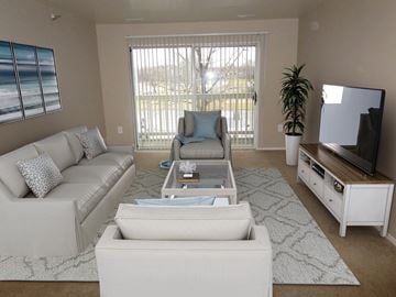 Davison apartment for rent - a living room with a couch and a tv