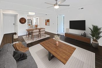 A living room with hard surface flooring