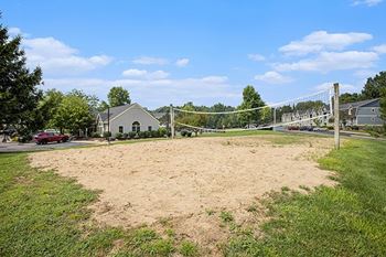 A sandy area with a volleyball court
