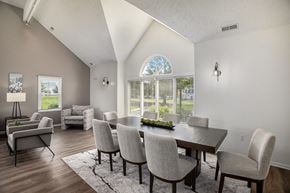 Lansing apartment for rent - Community building with high ceilings and plank flooring at Canal 2 Apartments in Lansing, MI