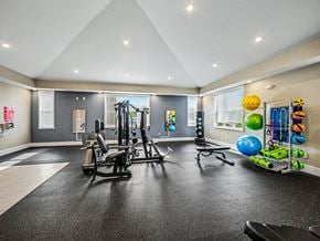 Huntsville apartment for rent - A spacious fitness center with a variety of exercise equipment at Chase Creek Apartment Homes, Huntsville, AL, 35811