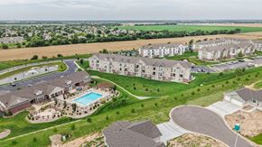 Maize apartment for rent - A large, well-maintained apartment complex with a swimming pool.