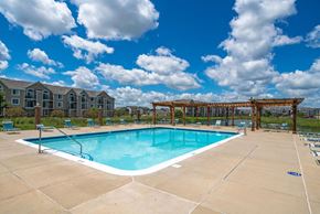 Ankeny apartment for rent - Swimming Pool with Lounge Seating at Fieldstream Apartment Homes, Ankeny, Iowa