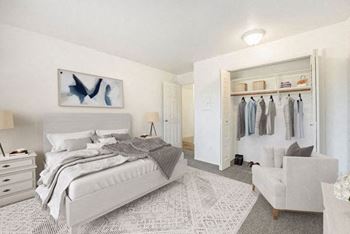 A bedroom with a large closet