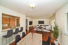 Portage townhouse for rent - a view of the living room and dining room from the kitchen at Foxwood and The Hermitage, Portage
