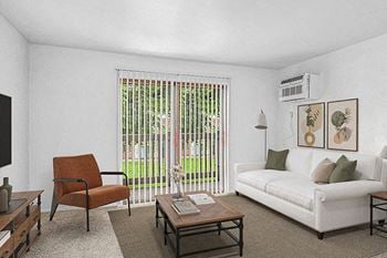 Living room with a sliding door to a balcony 