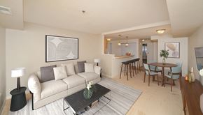 Madison apartment for rent - a living room and dining room with a couch and a table at Limestone Creek Apartment Homes, Madison, AL