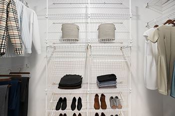 Walk in closets with wardrobe organizers 