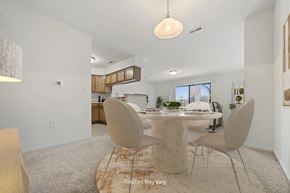 Peoria apartment for rent - A dining room with a table and chairs.