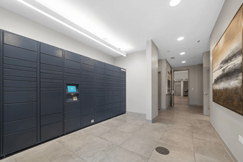 A row of lockers in the hallway of a building