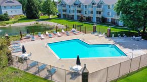 Elkhart apartment for rent - Lounge Chairs and Sundeck at North Pointe Apartments, Elkhart, IN