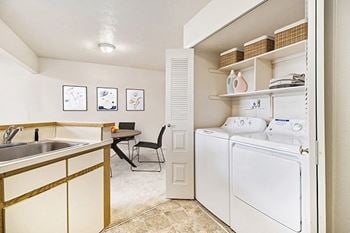 Kitchen with washer/dryer
