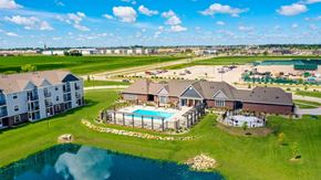 Grimes apartment for rent - Aerial View of Community Building and Recreation Areas at The Reserve at Destination Pointe, Grimes, IA, 50111