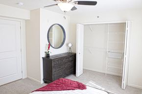 Grimes apartment for rent - A bedroom with a walk-in closet at The Reserve at Destination Pointe, Grimes