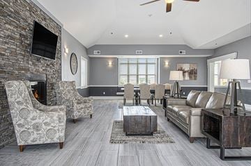 Grimes apartment for rent - A living room with a fireplace and a television on the wall.