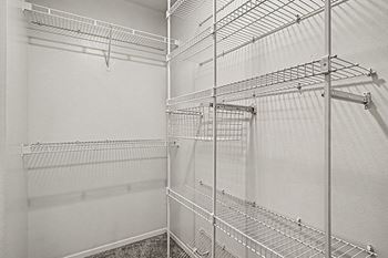 Walk-in closet with organizers offered