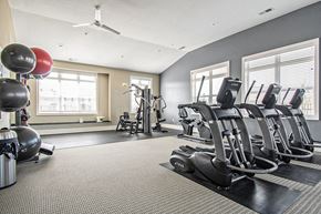 West Des Moines apartment for rent - Cardio machines in fitness center at Strathmore Apartment Homes, Iowa