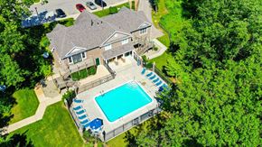Kalamazoo apartment for rent - Aerial View of Pool and Clubhouse at Tall Oaks Apartment Homes, Kalamazoo, MI, 49009