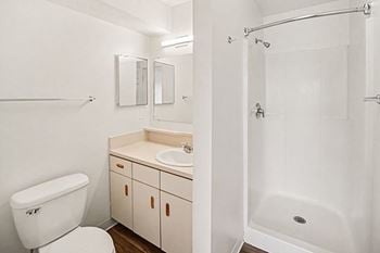 Two bedrooms have a second bath with walk-in shower