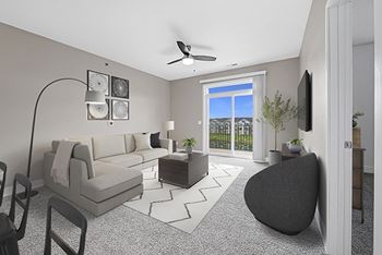A living room with a 9 foot ceiling and ceiling fan