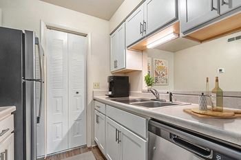 Galley kitchen with gas range