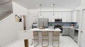 Alachua apartment for rent - a kitchen with an island and three stools