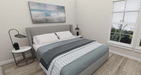 Alachua apartment for rent - a bedroom with a bed and a painting on the wall