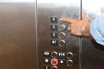 Four-story elevator serviced buildings