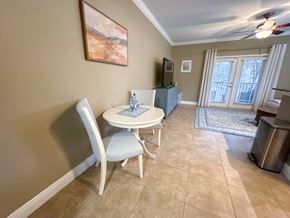 Gainesville townhouse for rent - A dining room with a white table and chairs.