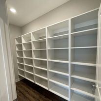 Deluxe closet system with shelving *
