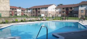 Brighton apartment for rent - Brighton Cove outdoor pool. Expansive sundeck with lounge chairs. Brighton Cove in the background.