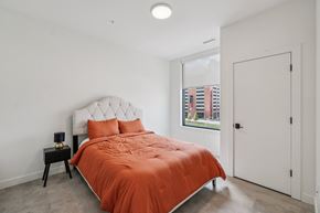 Detroit apartment for rent - Bedroom with bed at Lafayette West Apartments, Detroit, MI, 48207